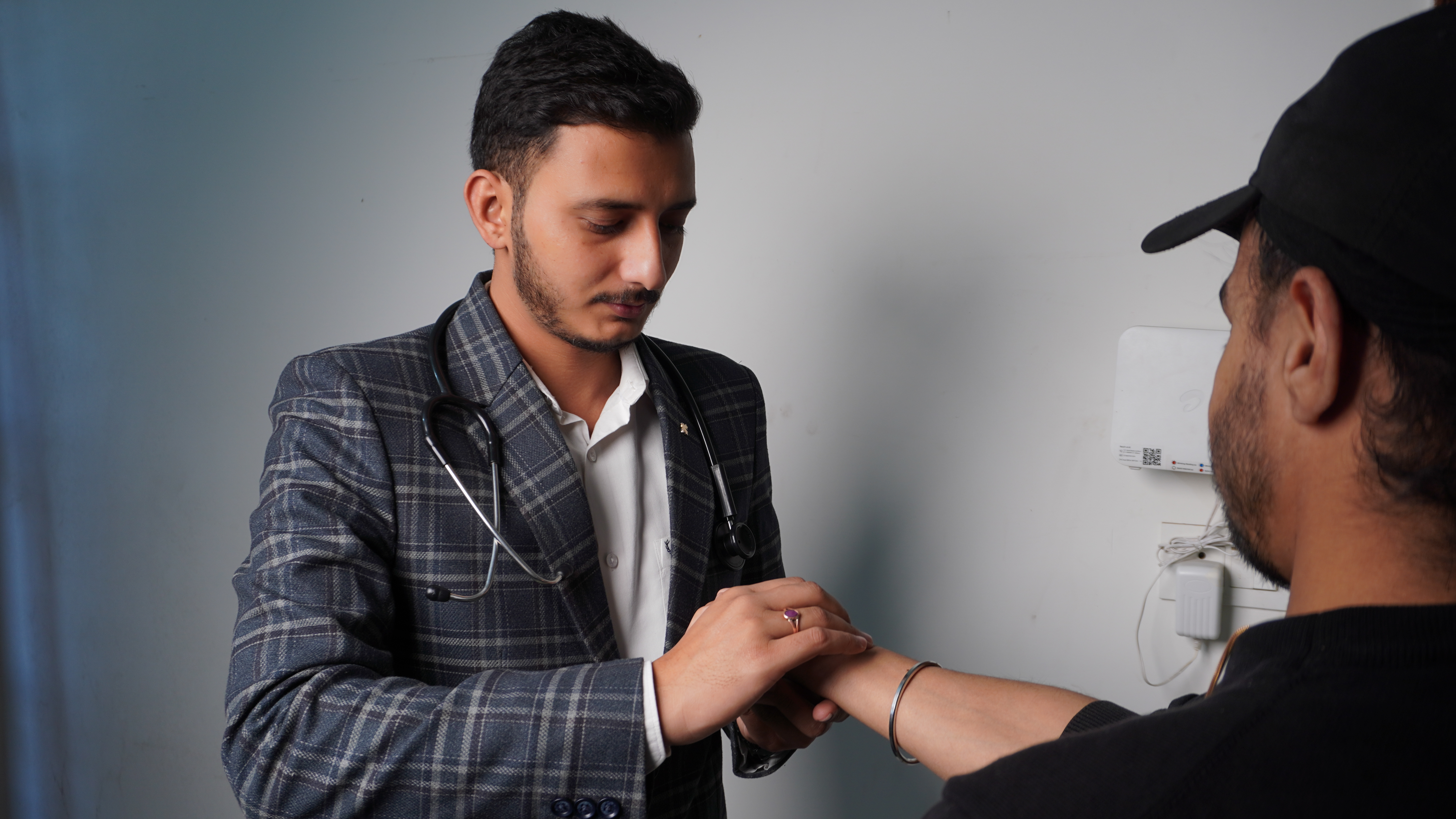 Dr. Manpreet treating patient